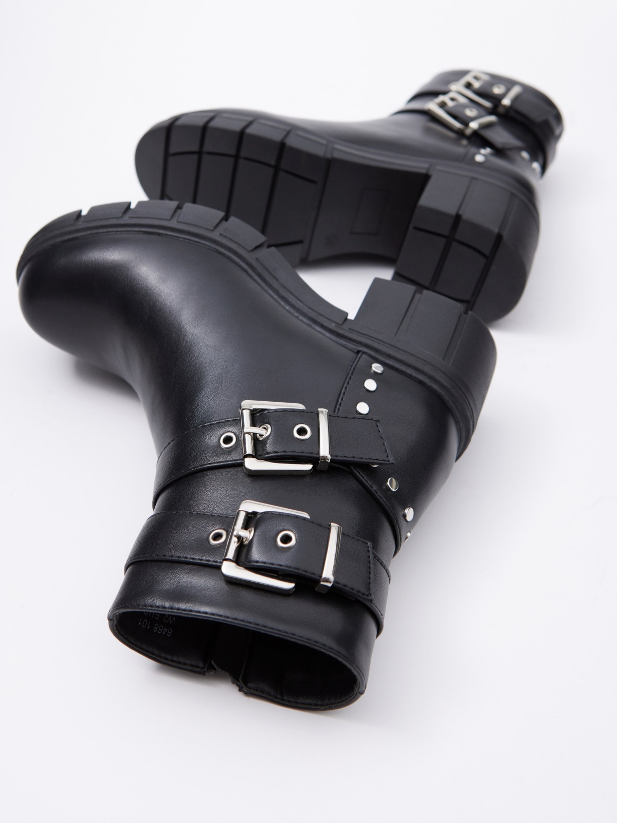 Ankle boot with track sole buckles black detail view