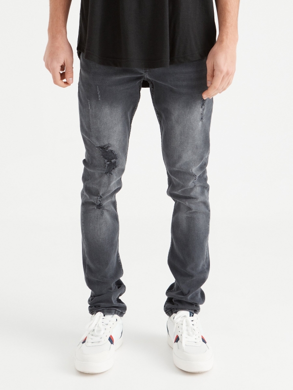 Ripped washed gray slim jeans dark grey middle front view