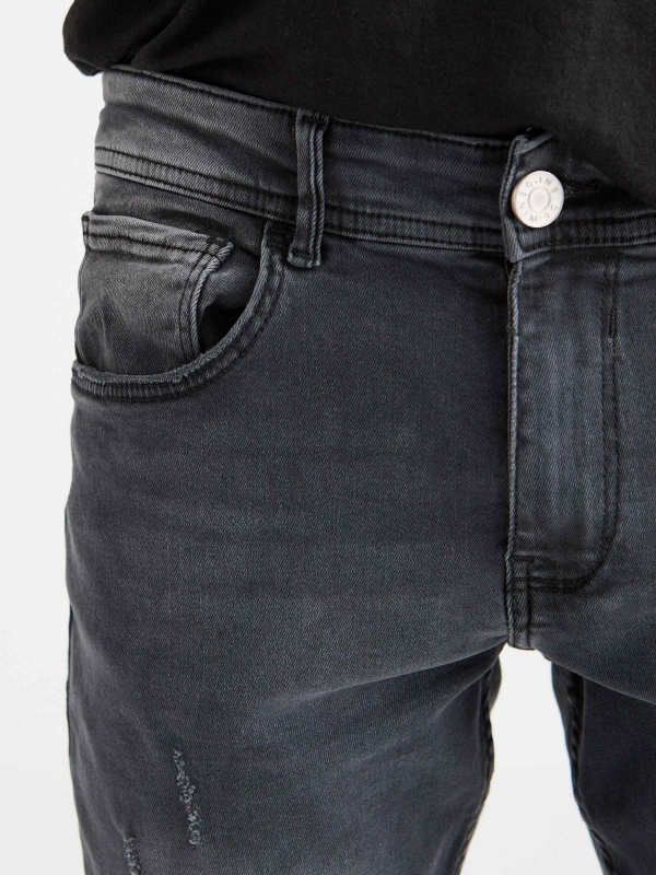 Ripped washed gray slim jeans dark grey detail view