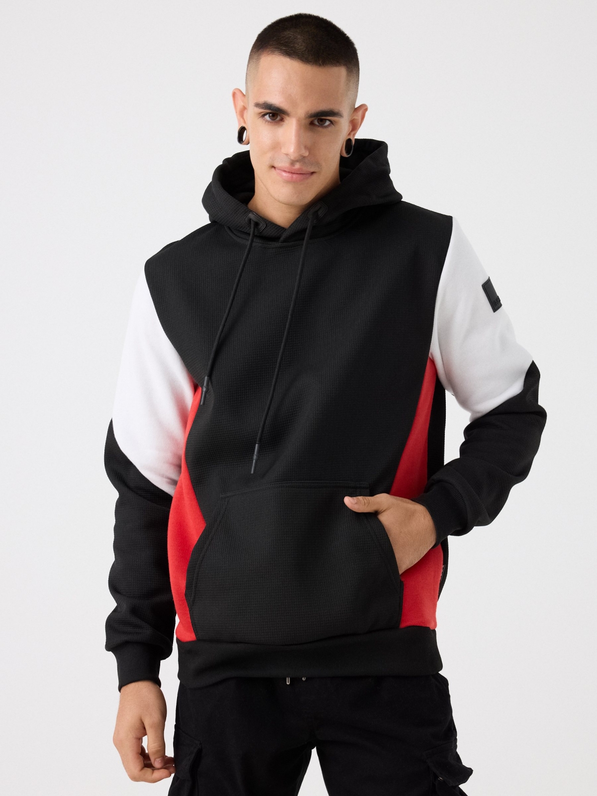 Sudadera color block bolsillo