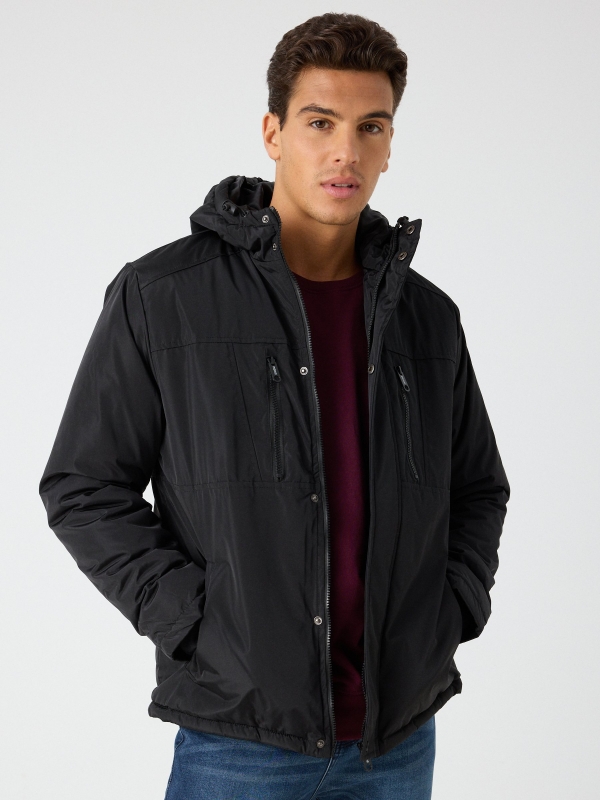 Hooded black parka