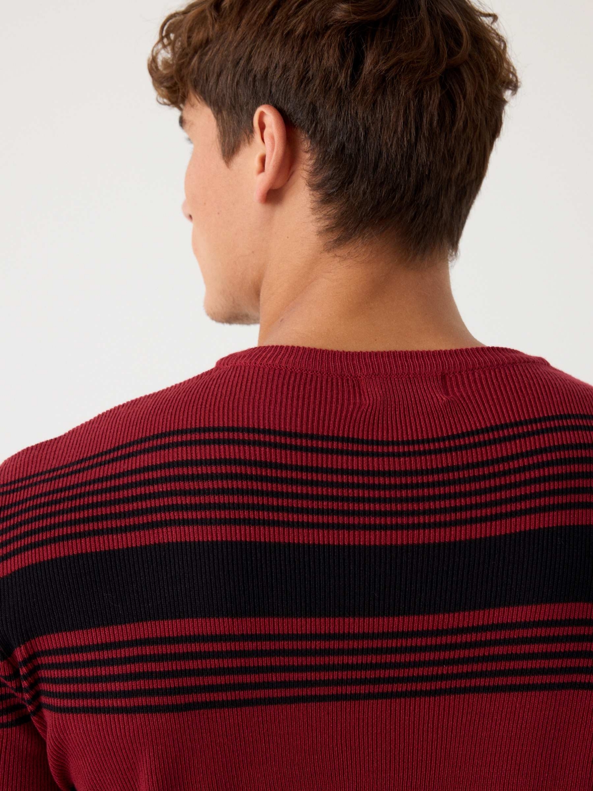 Striped ribbed knit jumper candle detail view