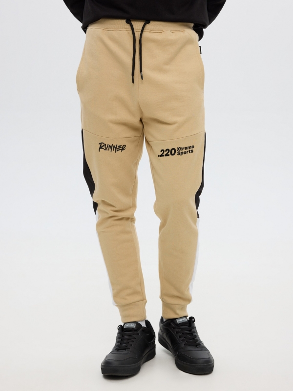 Pantalon jogger arena vista media frontal