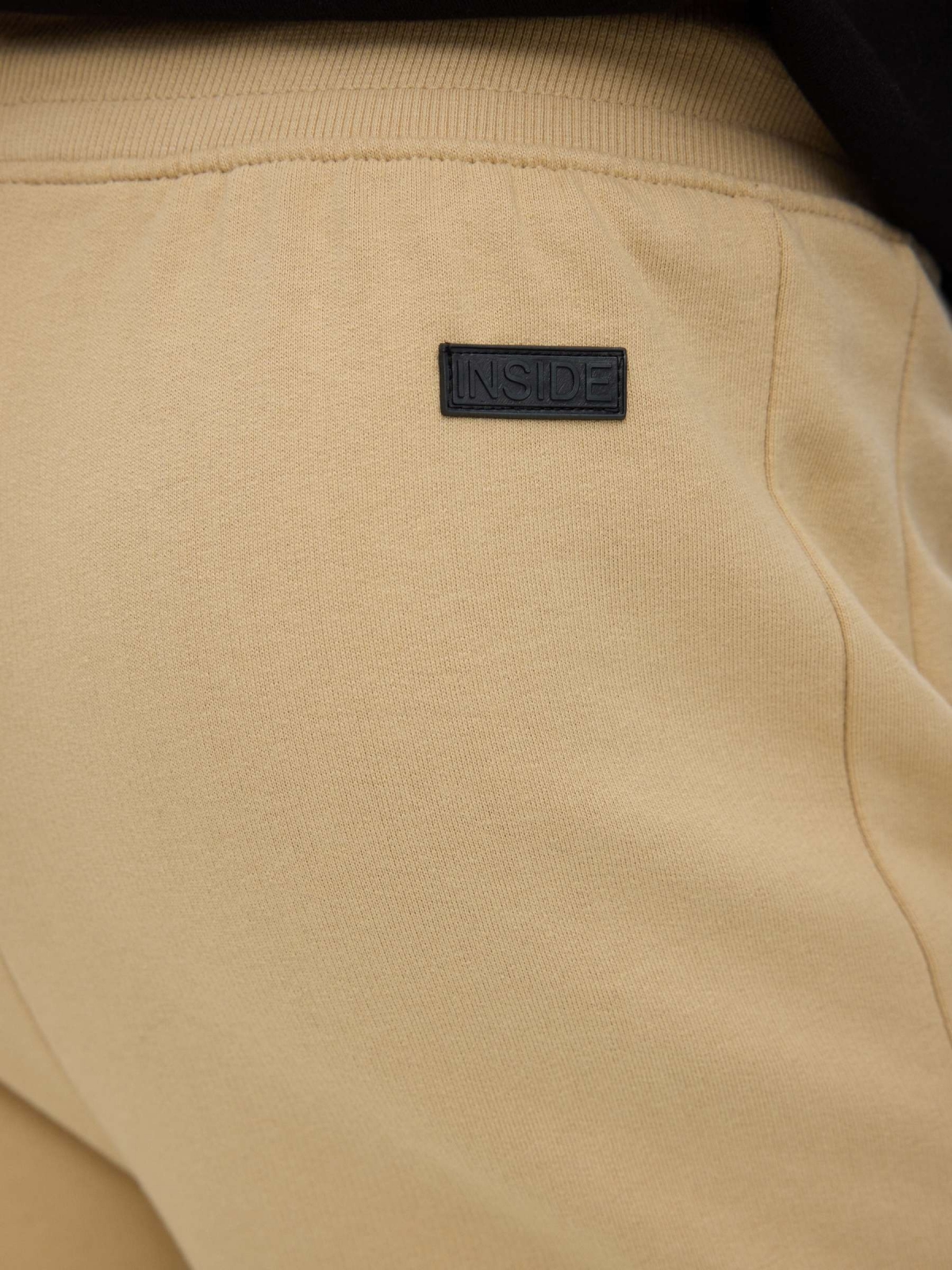 Jogger pants sand detail view