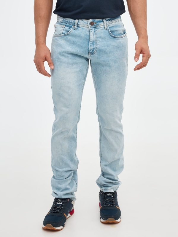 Jeans slim azul desgastados azul vista media trasera