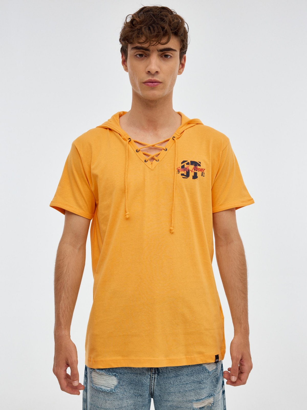 Sports print T-shirt pastel yellow middle front view