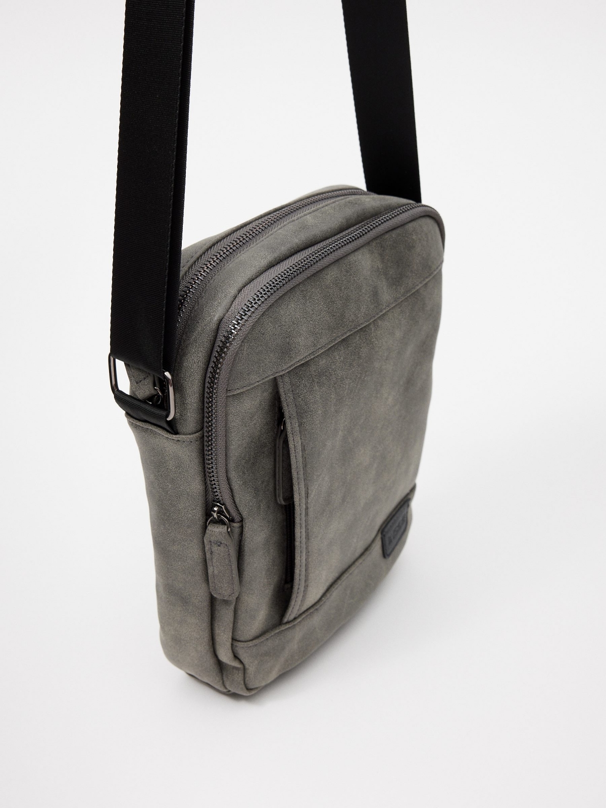 Grey leatherette crossbody grey 45º side view