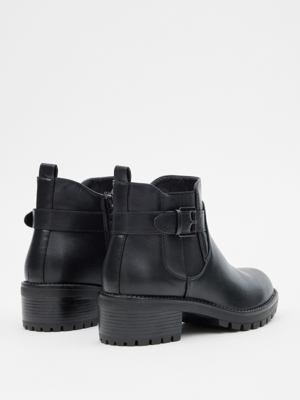 Ankle boots with buckle and elastics black 45º back view