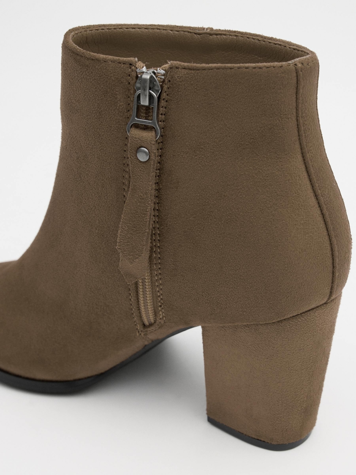 Brown ankle boot with heel beige detail view