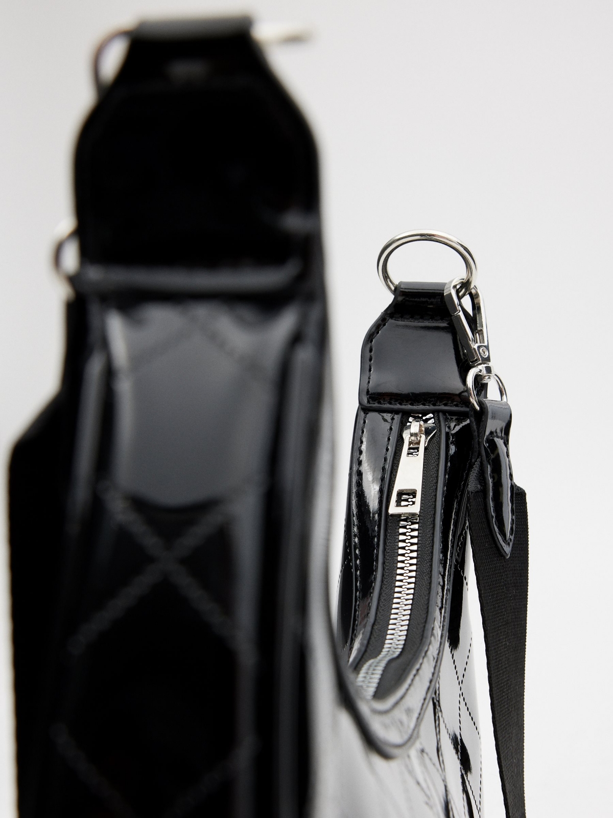 Black patent leather handbag black detail view