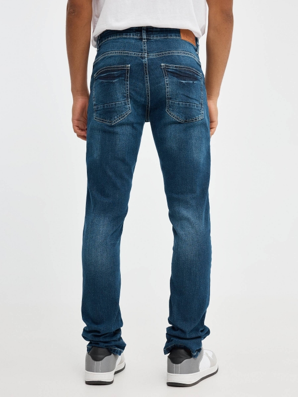 Blue slim jeans blue middle back view