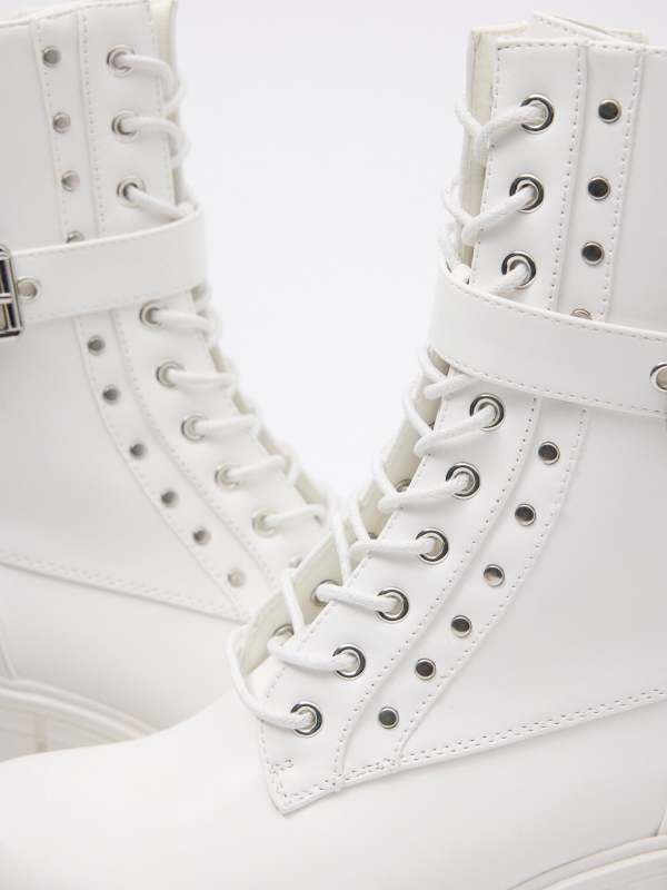 Ankle boots with buckle and studs white detail view