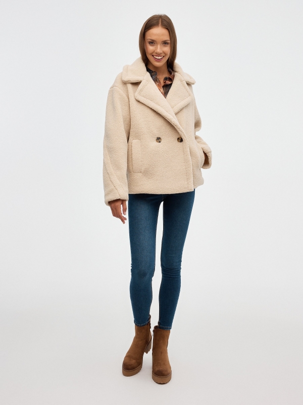 Short sheepskin coat beige front view