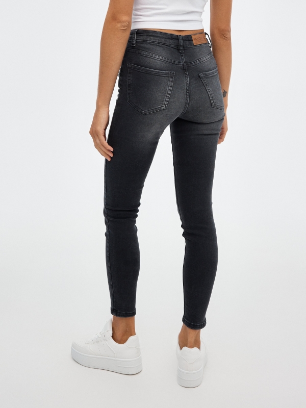 Jenas basic skinny mid-rise black middle back view