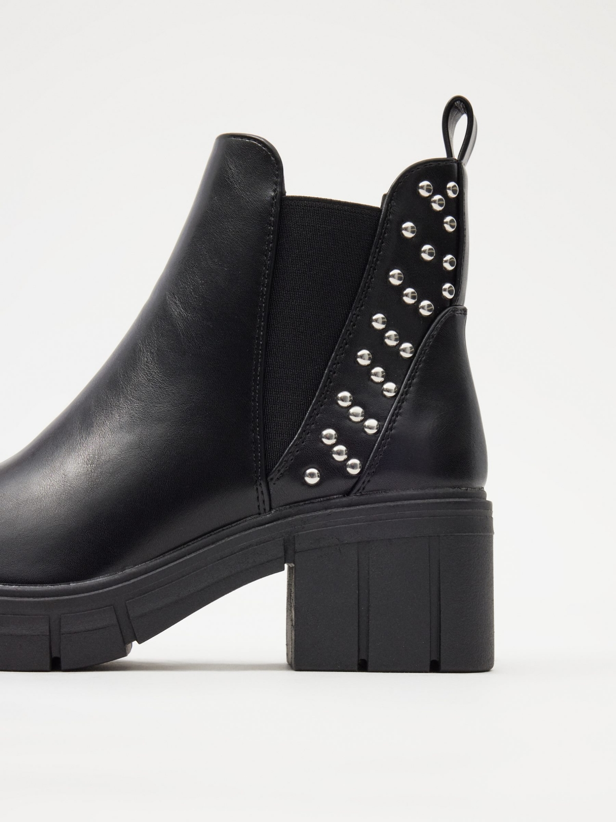 Ankle boots with elastic and studs black detail view