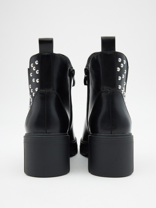 Ankle boots with elastic and studs black detail view