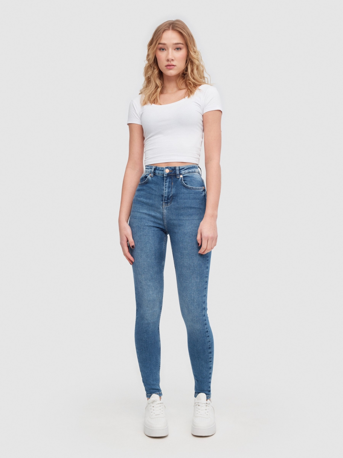 Mid-rise skinny jeans dark blue front view