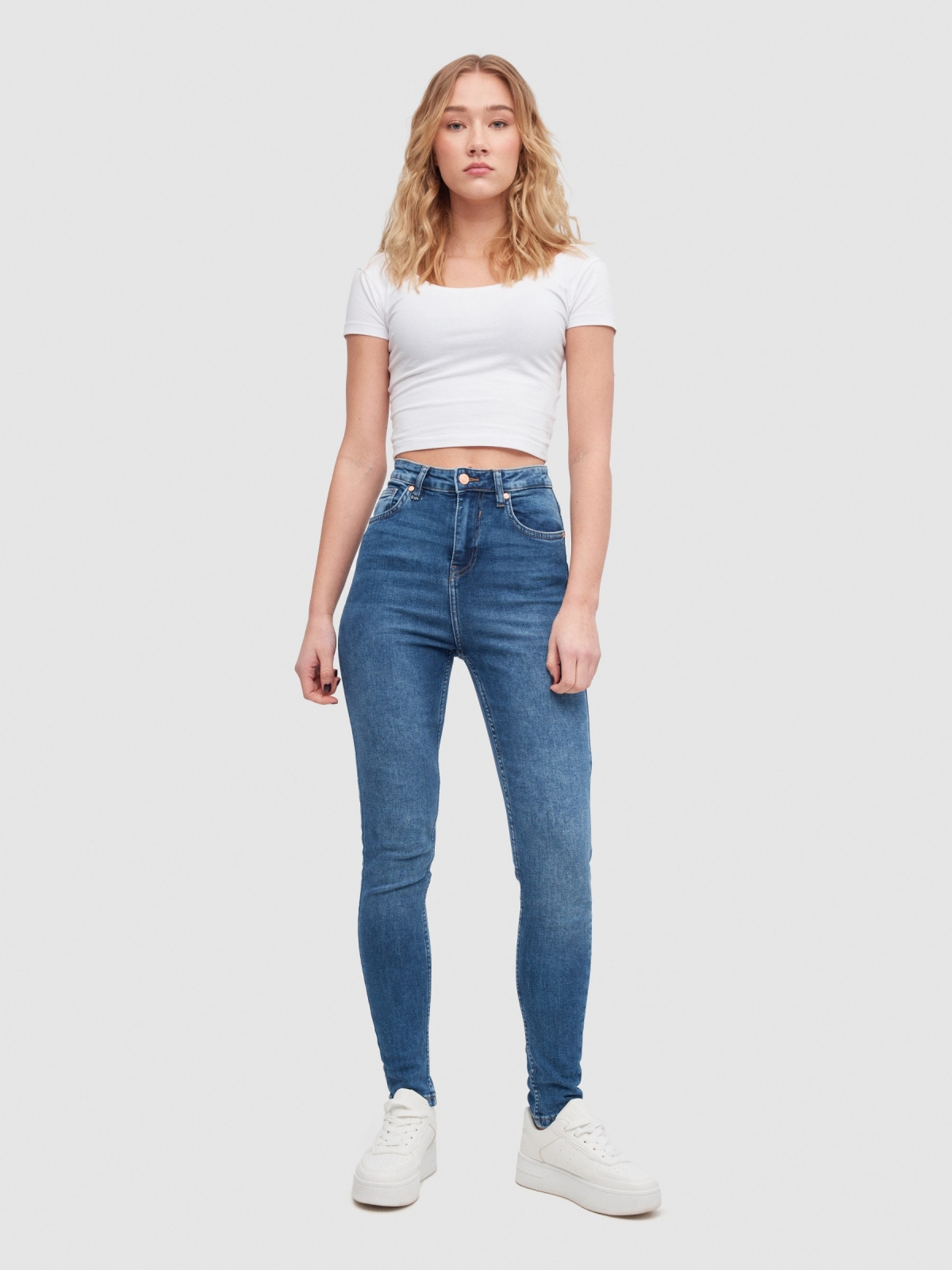 High rise skinny jeans blue front view