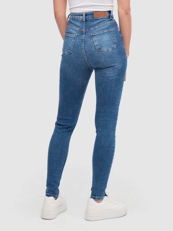 High rise skinny jeans blue middle back view