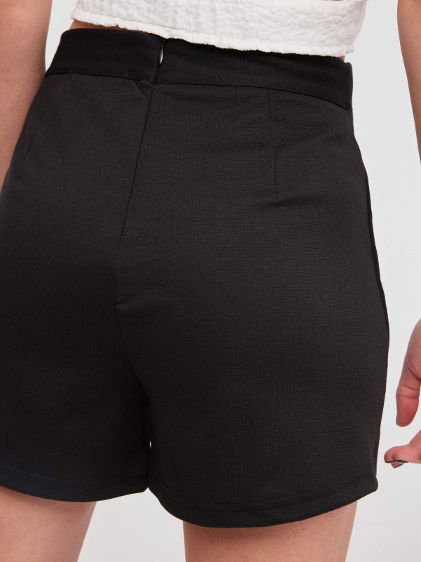 Buttoned skort black detail view