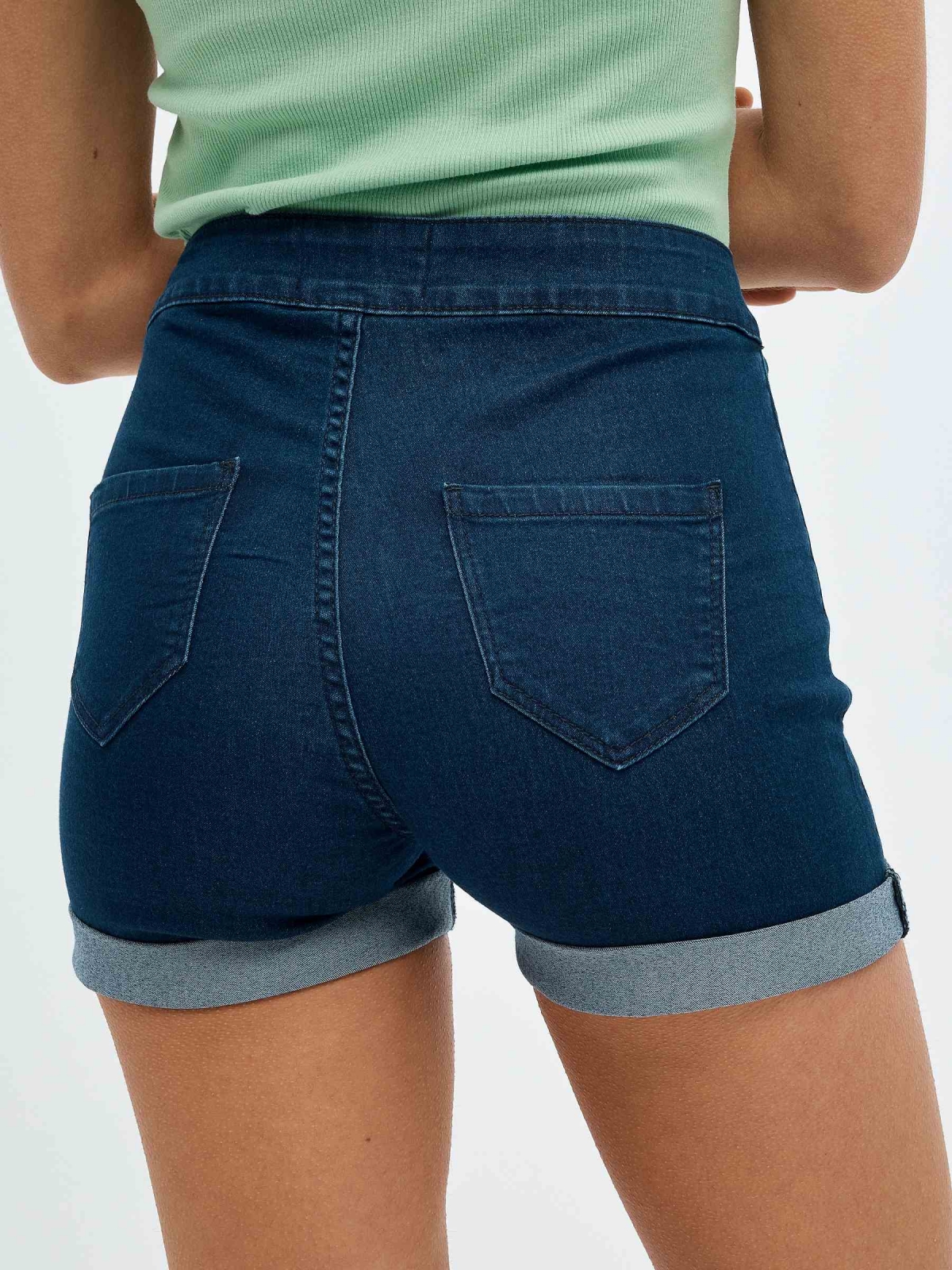 High-waisted denim shorts blue detail view