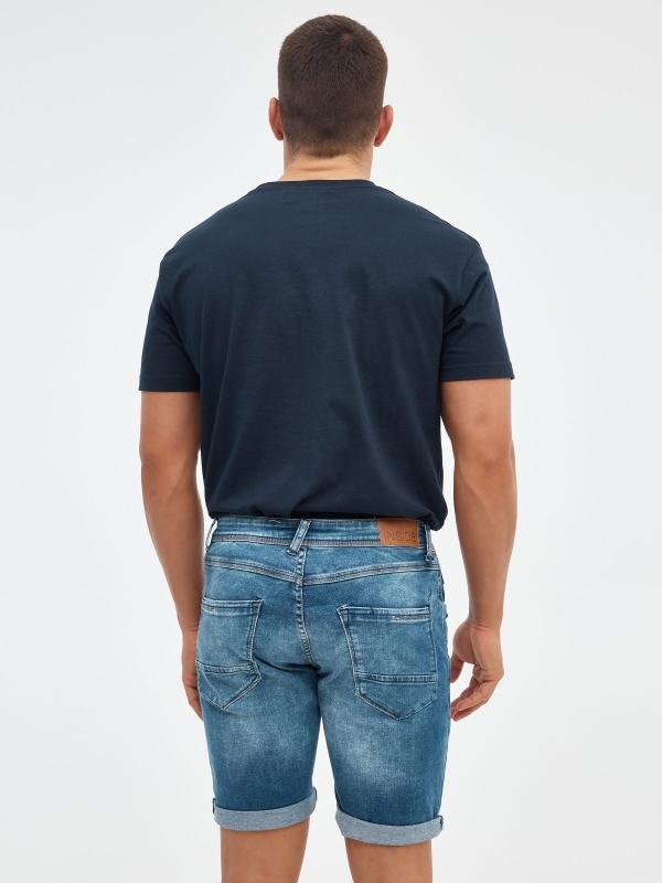 Distressed blue denim bermuda blue middle back view