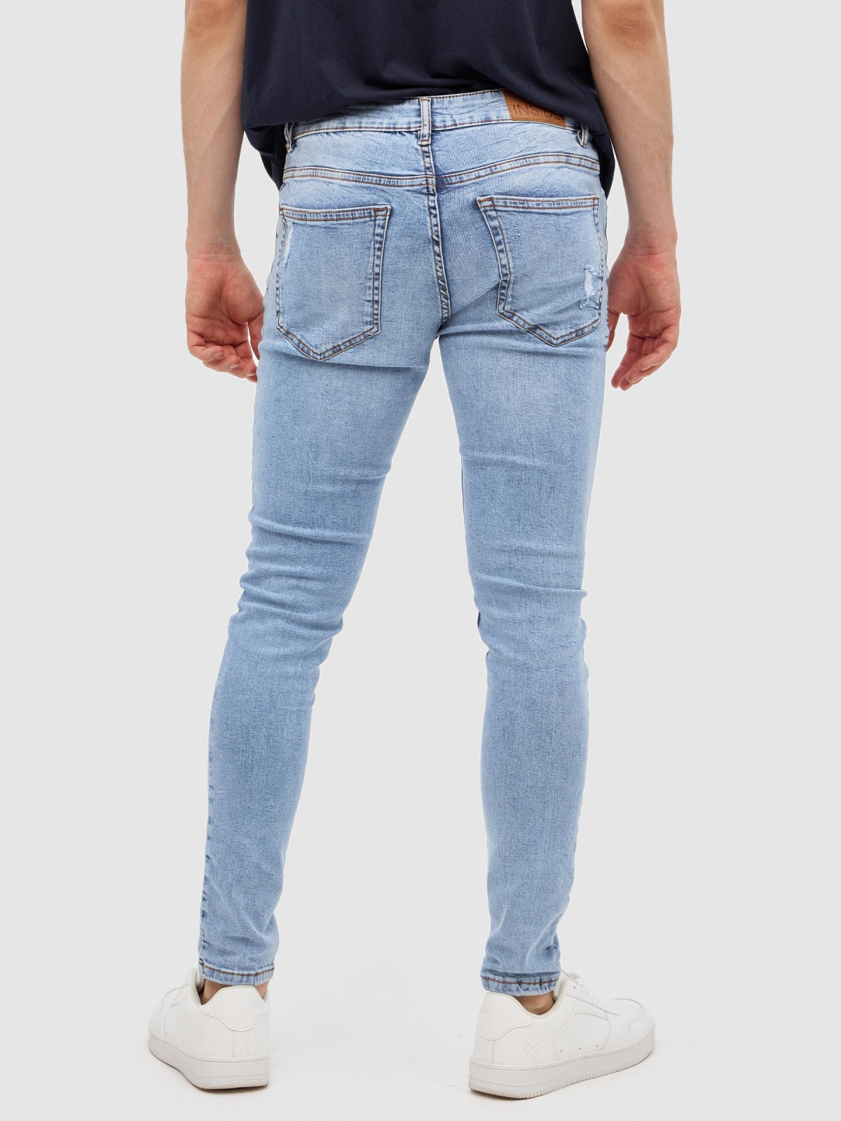 Jeans super slim azul vista media trasera