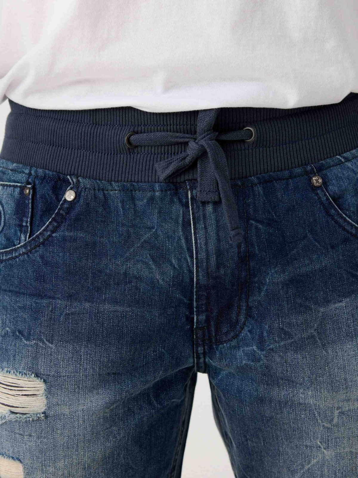 Ripped denim shorts elastic waist blue detail view