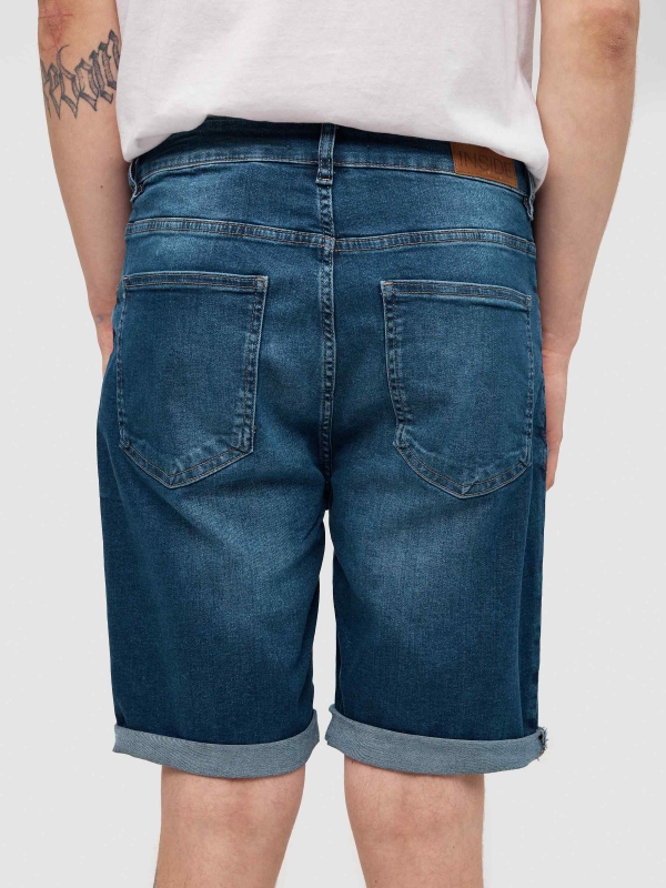 Dark blue slim denim bermuda shorts blue detail view