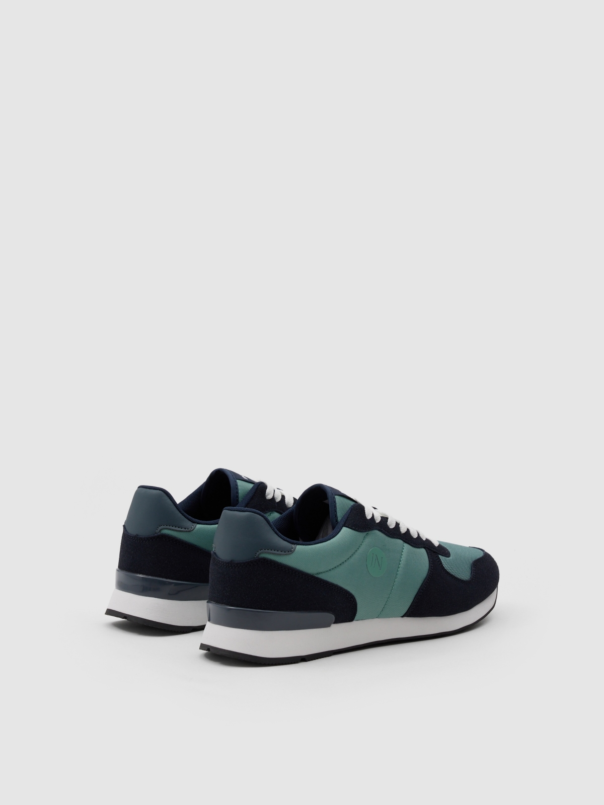 Basic two-tone sneaker aquamarine 45º back view