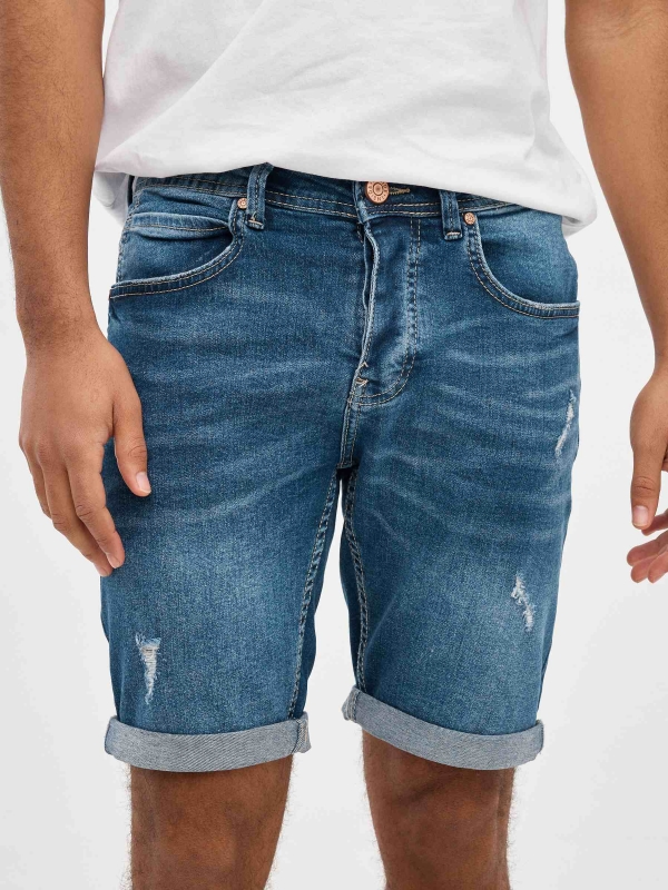 Ripped distressed denim bermuda short blue detail view