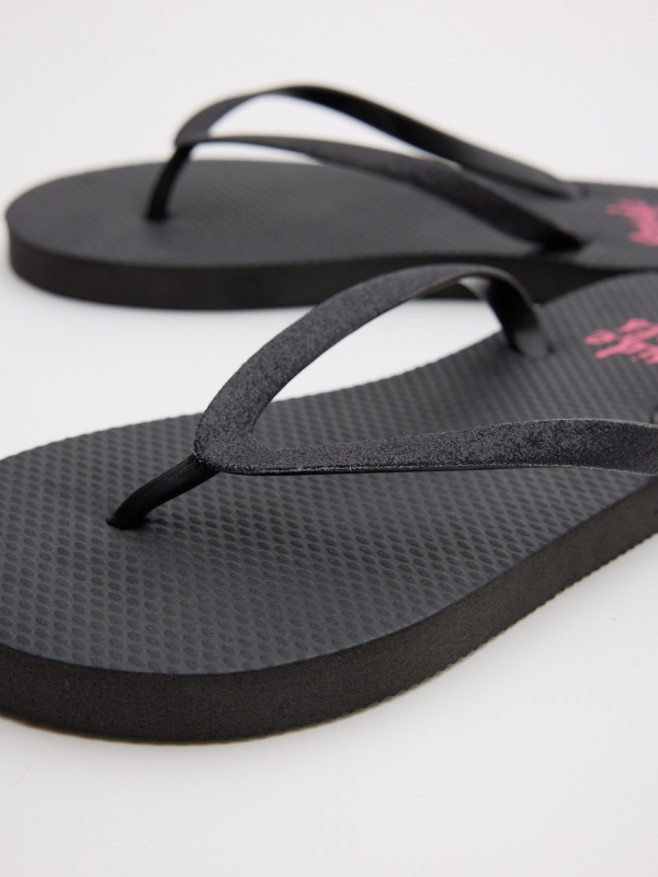 Black glitter flip flop black detail view