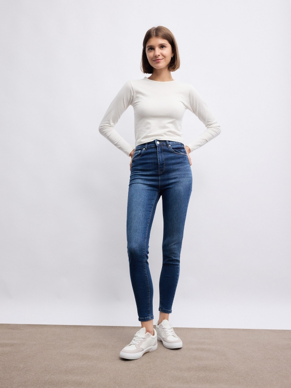 Jeans skinny azul cintura alta com cinco bolsos