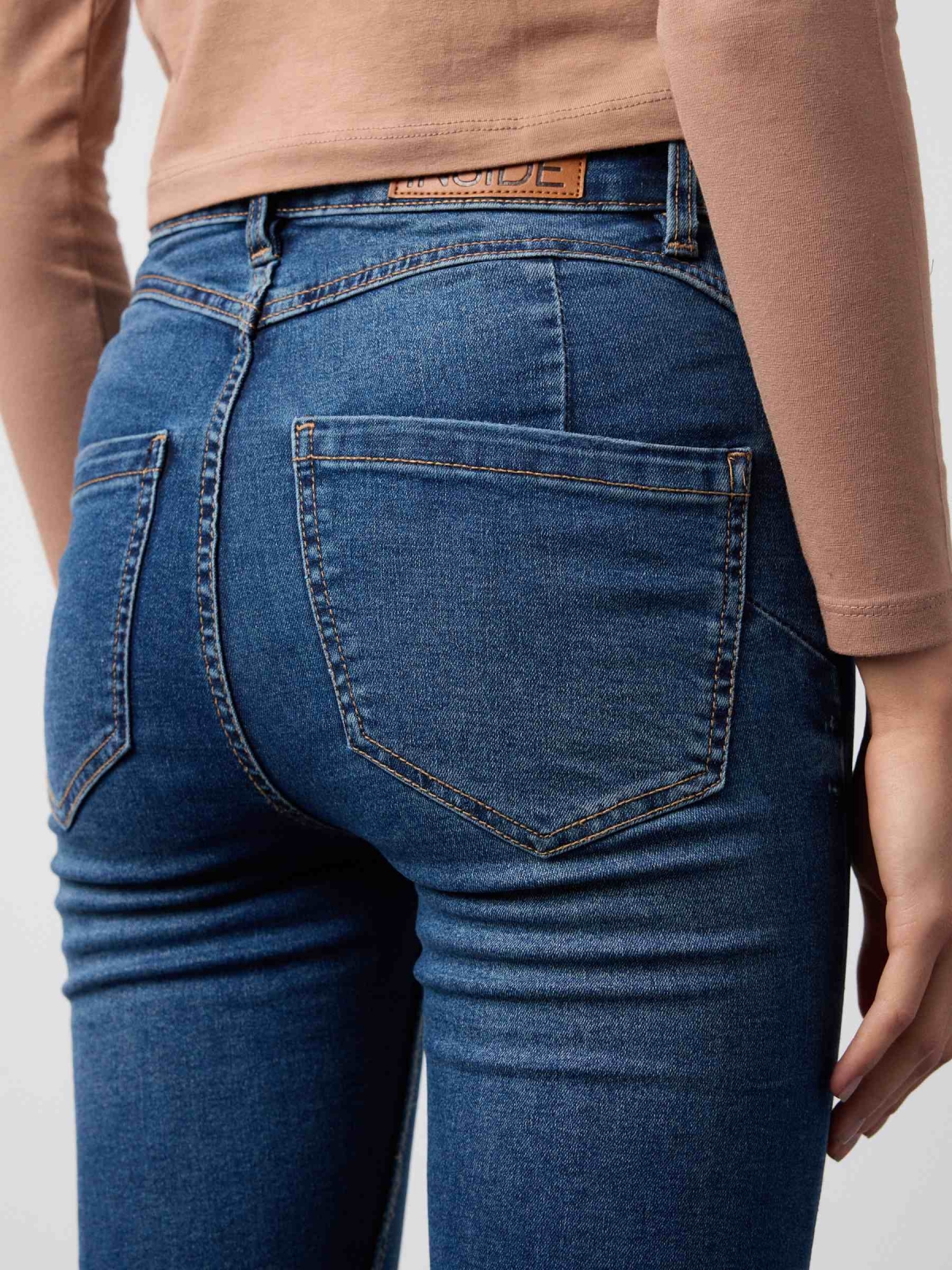 Skinny jeans with push up blue detail view