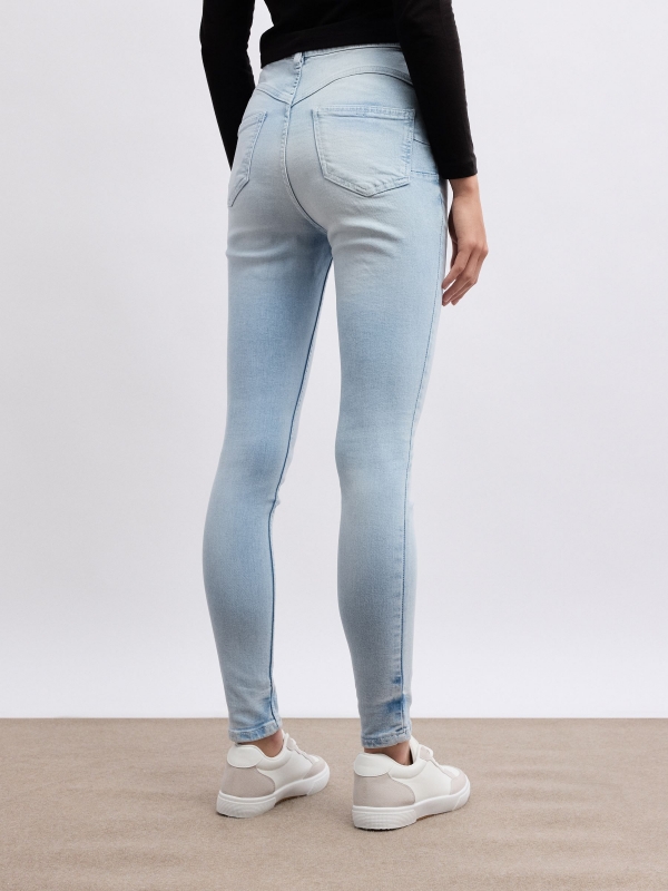 Denim skinny jeans high rise blue middle back view