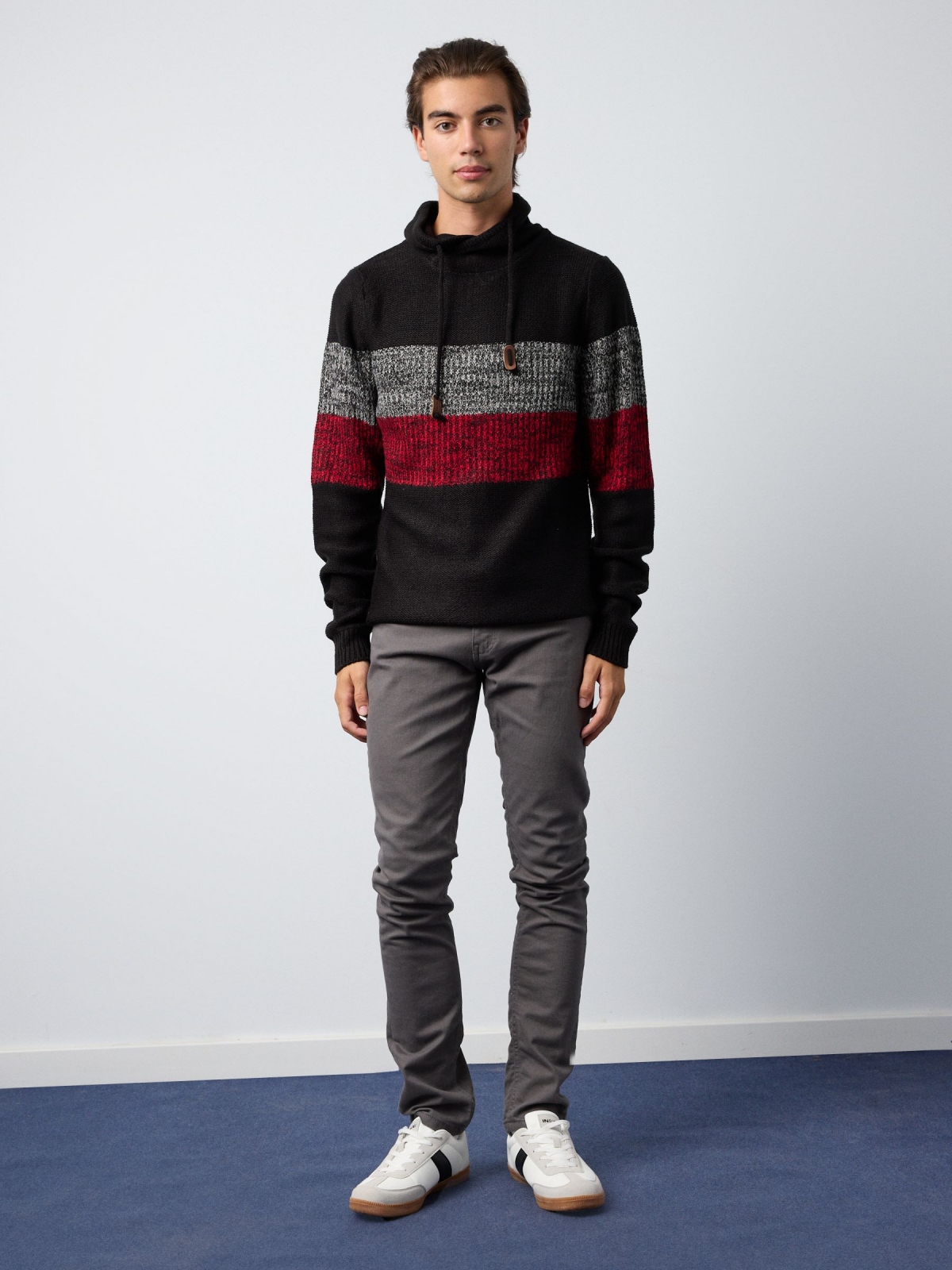 Striped jumper with laces black front view