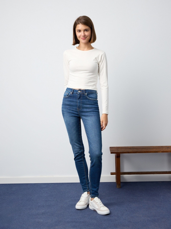 High-waisted skinny jeans with washed effect navy front view