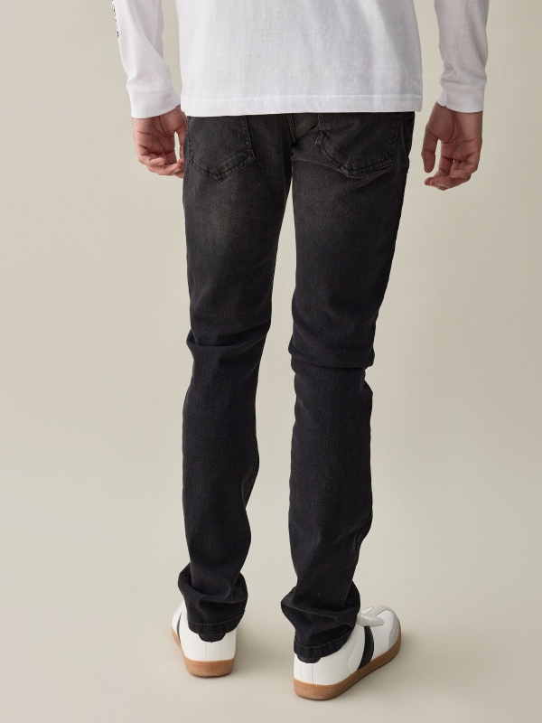 Dark gray basic jeans black middle back view