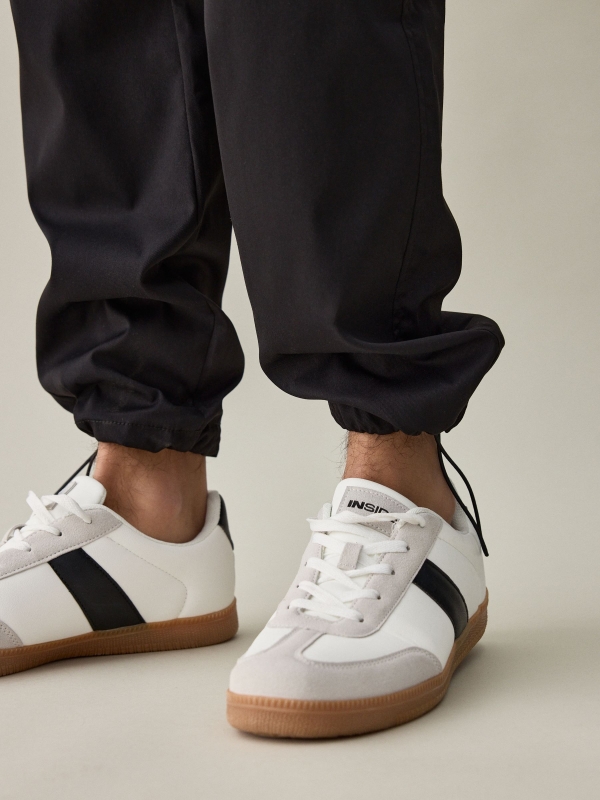 Jogger pants with adjustable ankles black detail view