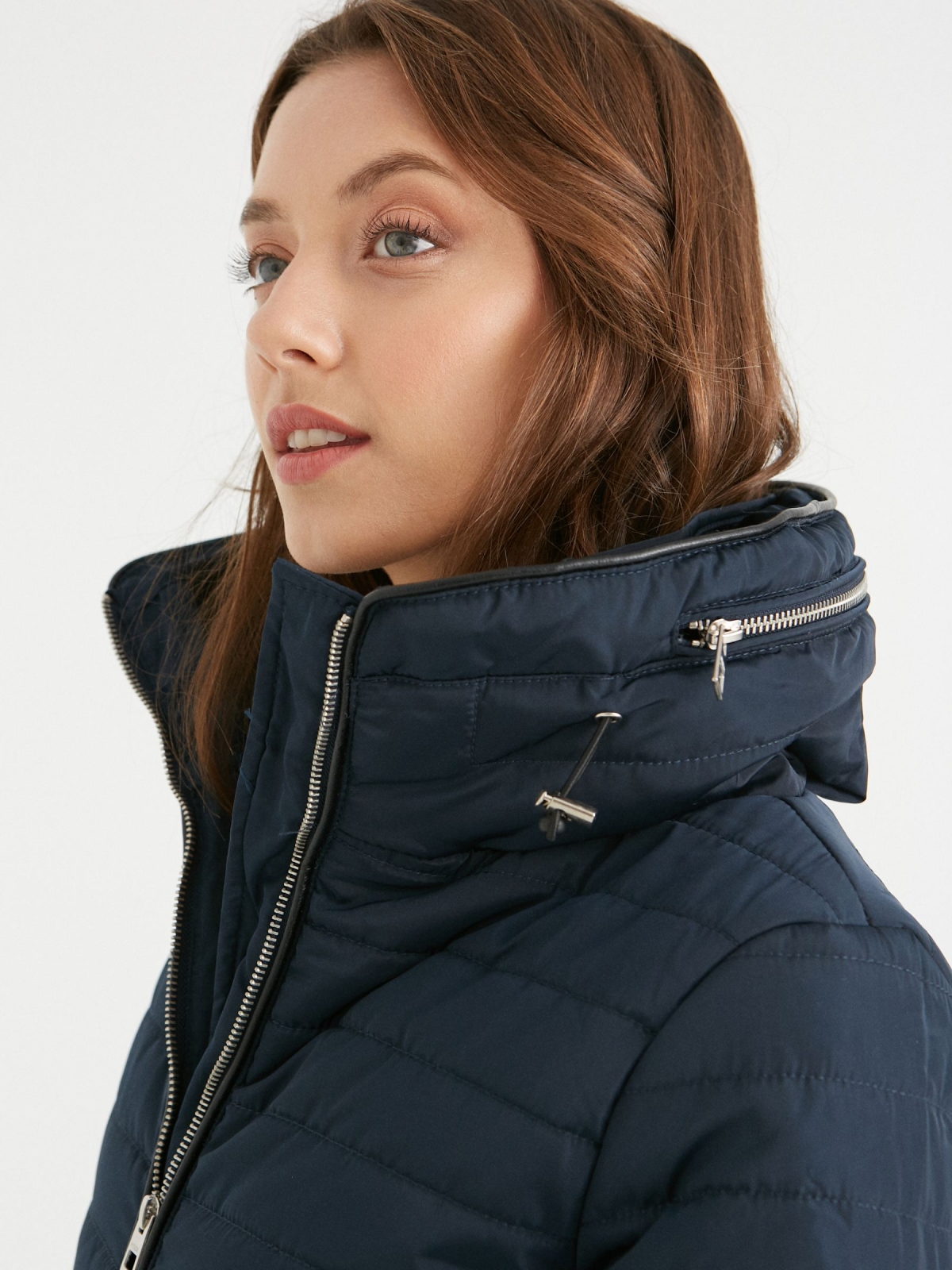 Quilted coat with hood blue detail view