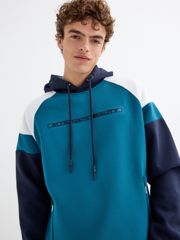 Color block text hoodie blue detail view