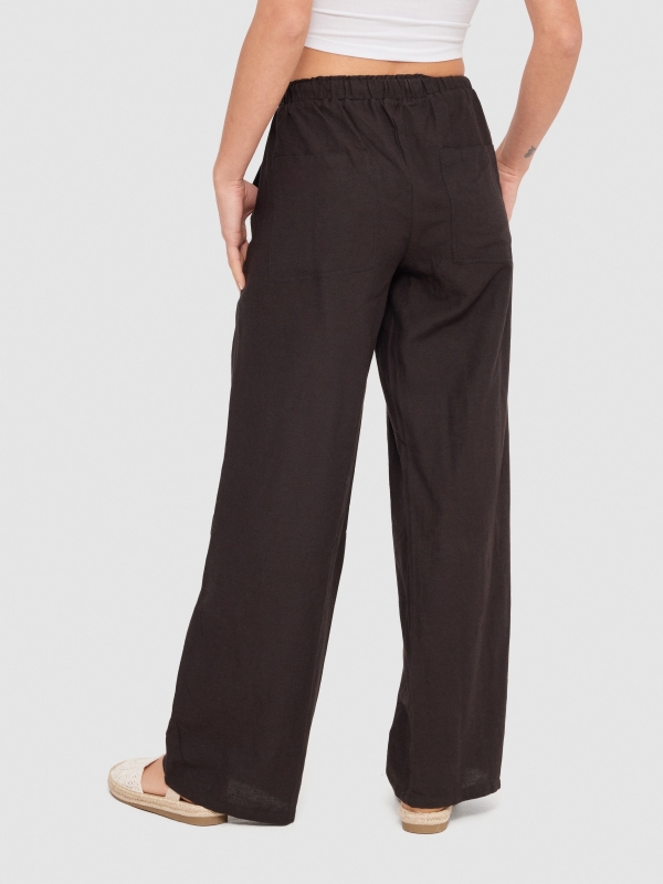 Pantalón wide-leg lino negro vista media trasera