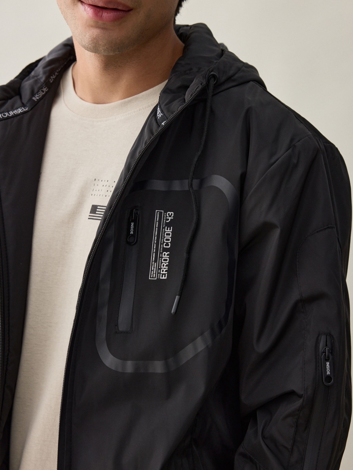 Black padded jacket black detail view