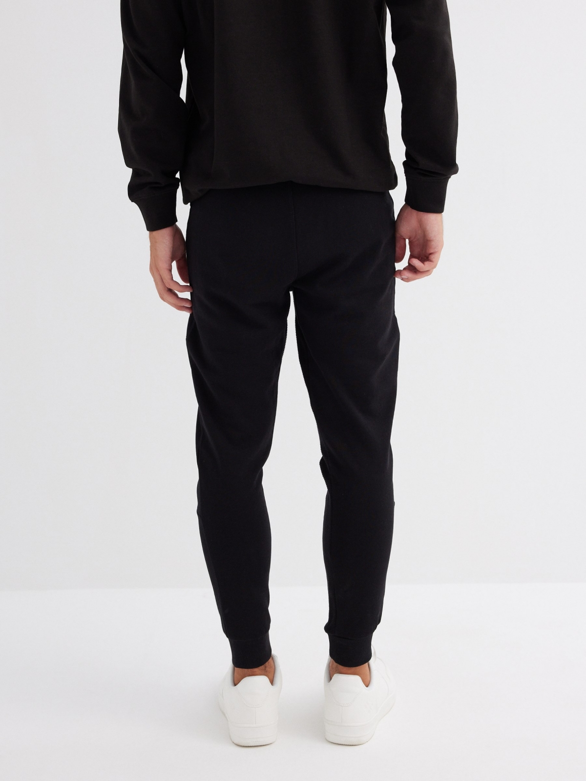 Sport jogger pants black middle back view