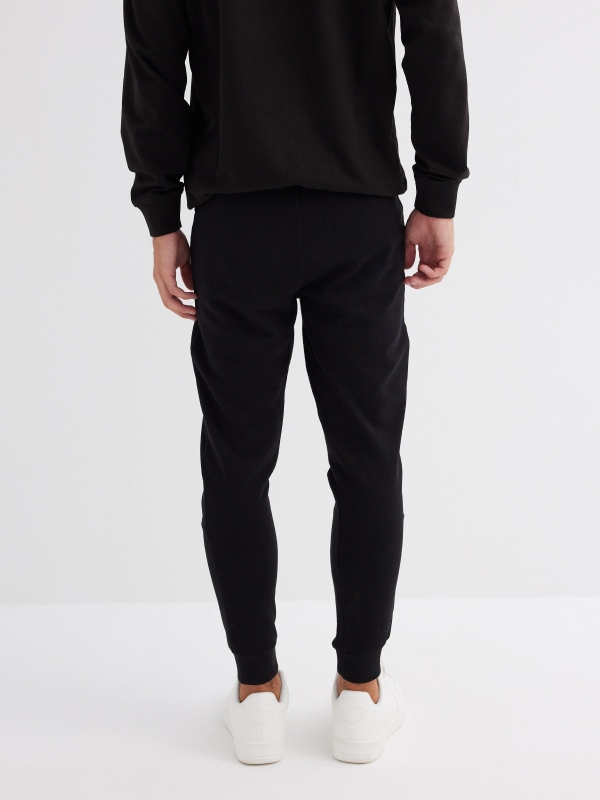 Sport jogger pants black middle back view