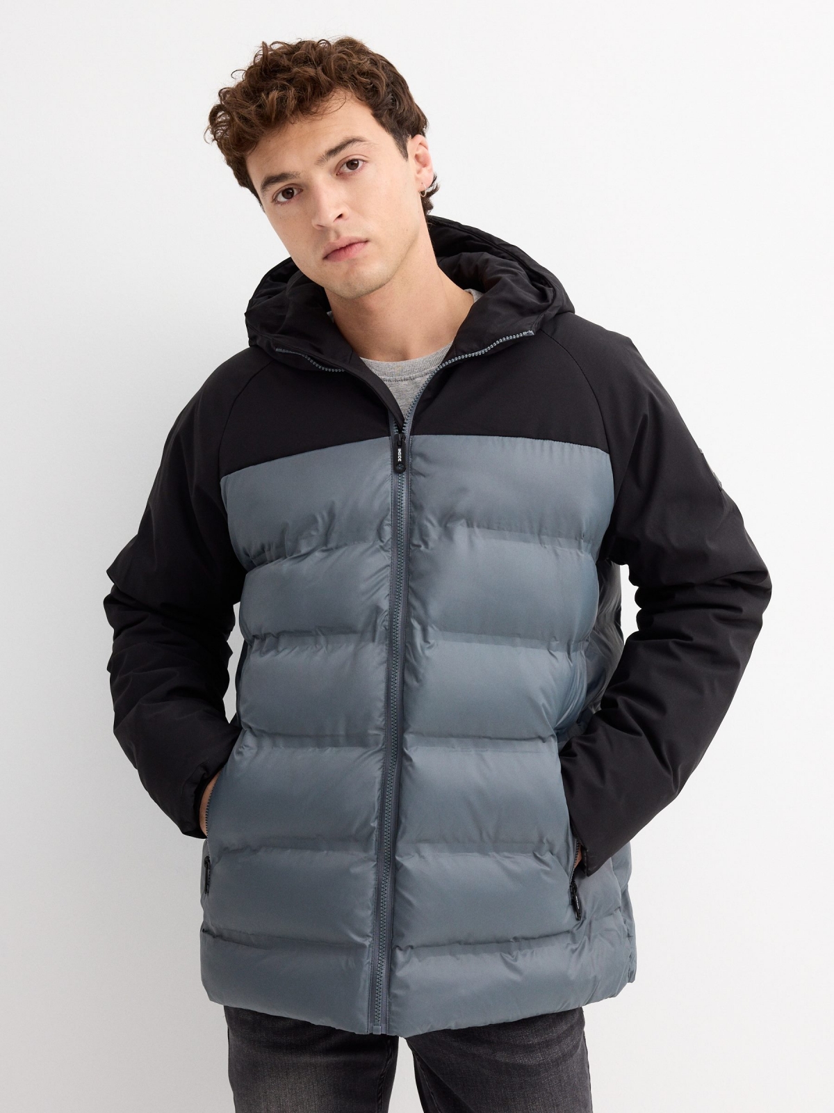 Blue block color quilted coat black middle front view