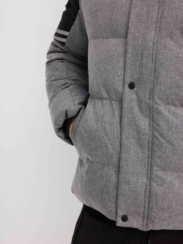 Block color quilted coat grey detail view