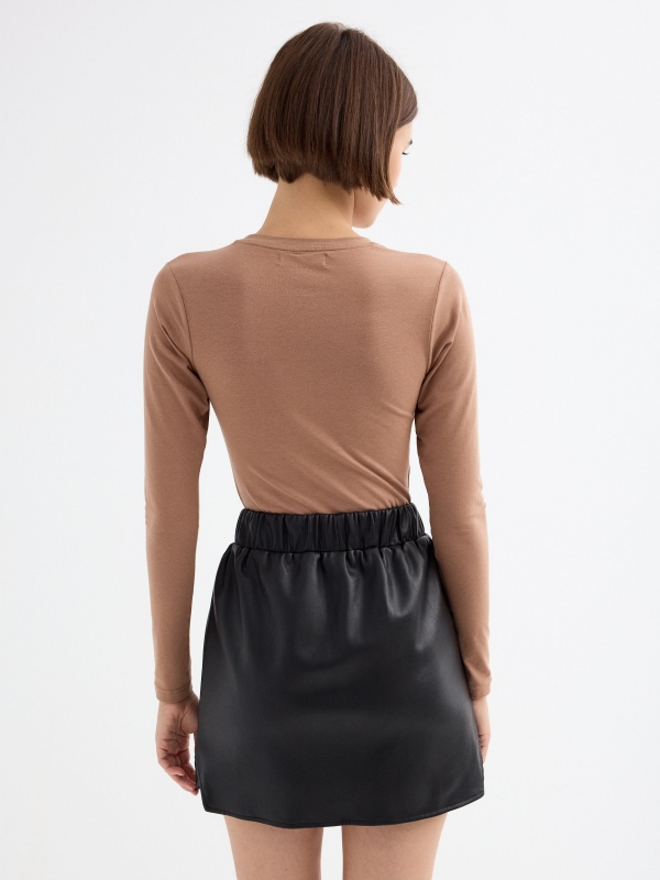 Faux leather skirt with elastic waist black middle back view