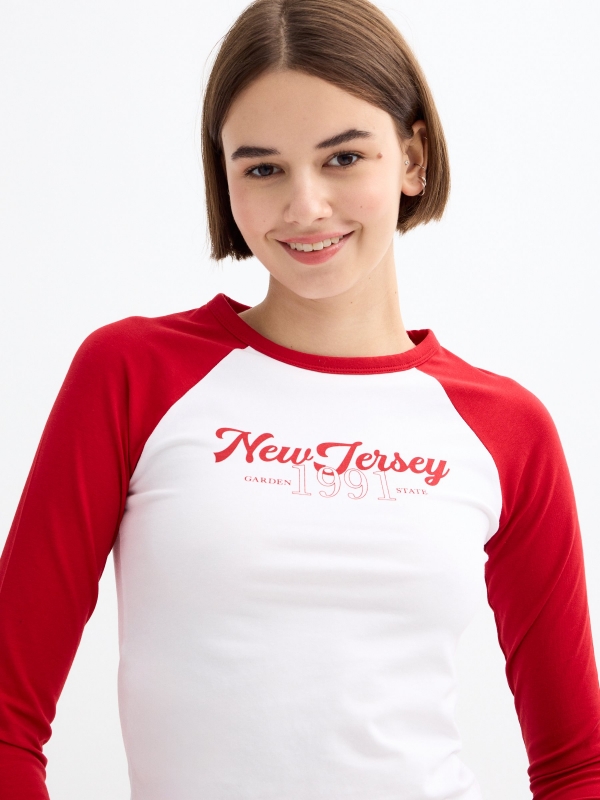 Long sleeve raglan crop top with graphics carmine detail view