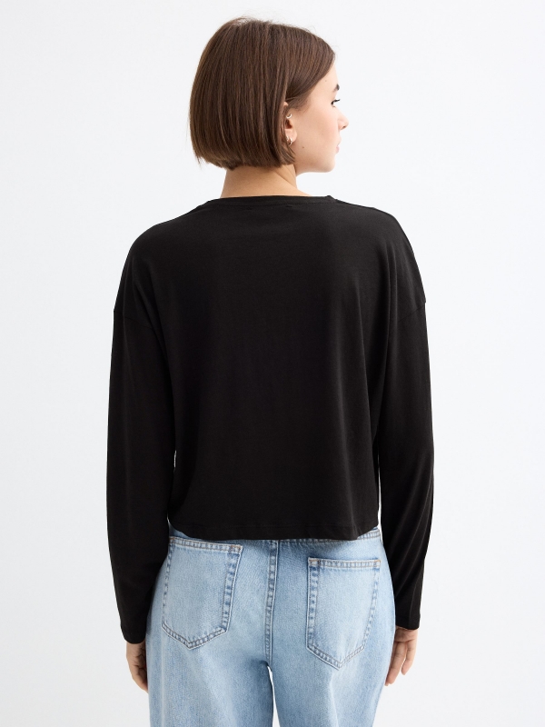 Black long sleeve t-shirt with graphic black middle back view